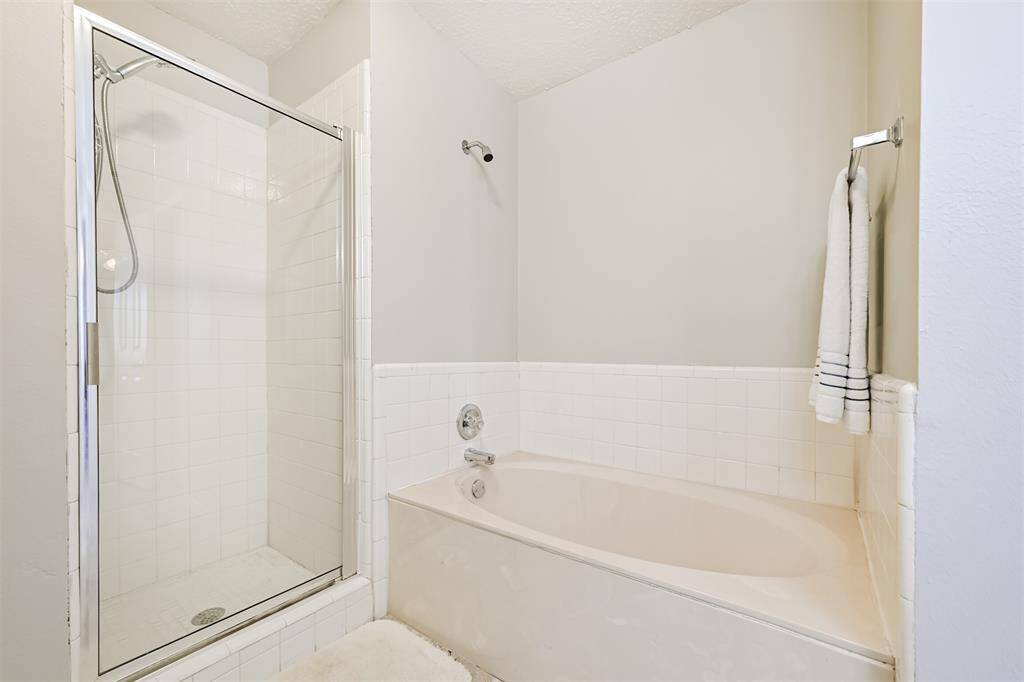 Primary bedroom with ensuite bathroom