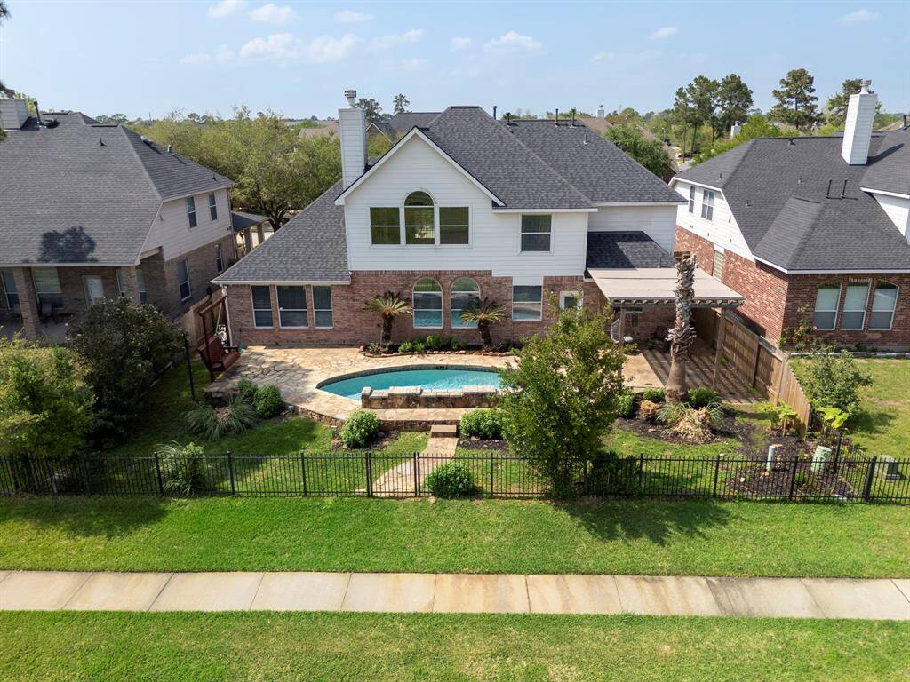 Sparkling pool, extensive decking, extra greenspace all overlooking the lake!