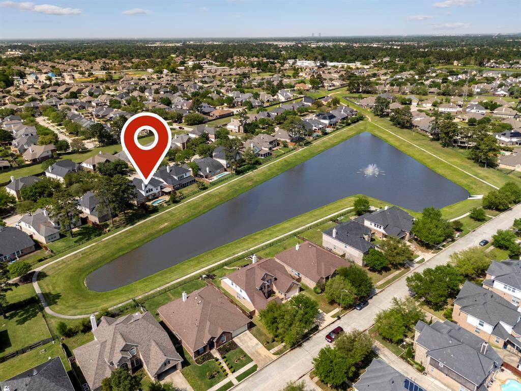 This 4,022 sqft home sits on an oversized lot with direct lake access right out your back door.