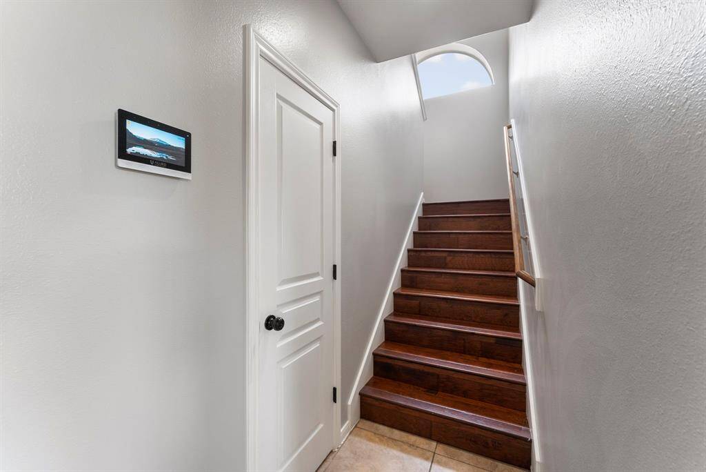 Bonus floorplan feature: This home has two sets of stairs! One is off of the entry and the other is across the home by the kitchen!