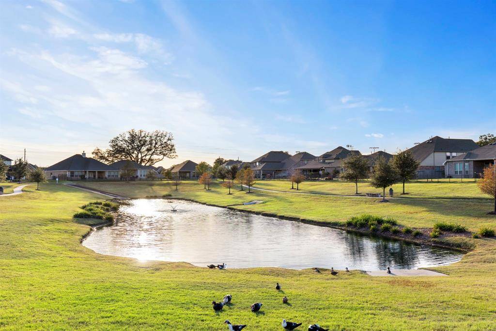 The third neighborhood lake, also providing around-the-lake sidewalks for outdoor enjoyment.