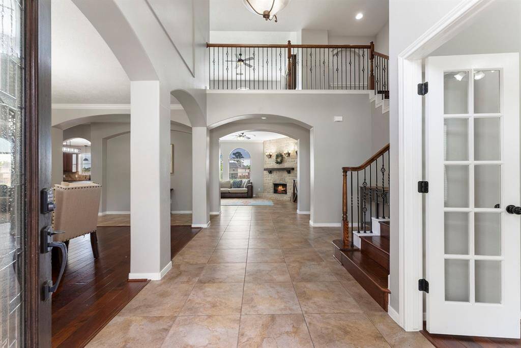 High ceilings, neutral palette and tons of natural light greet you at the front door.