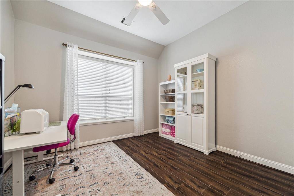 Secondary bathroom with dual sinks, granite counters.