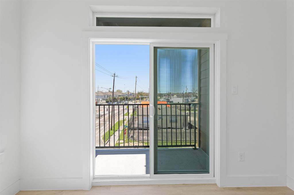This fantastic bedroom includes a tranquil balcony.
