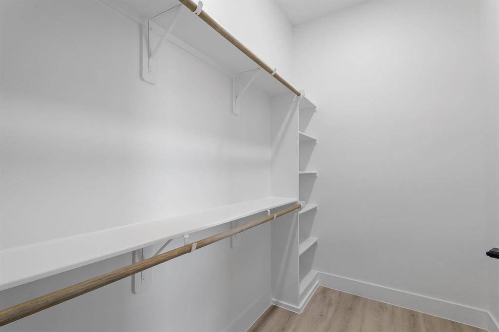Huge walk-in closet in the primary bathroom.