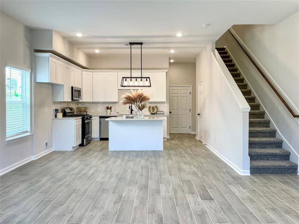 Move-in ready and features a beautiful kitchen