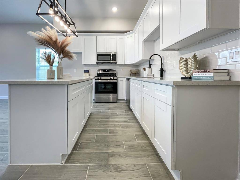 Another view of the kitchen