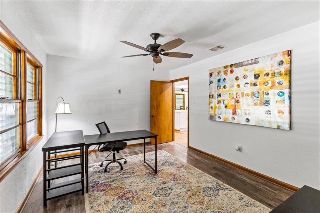 And the third bedroom has its own private entrance and is currently set up as a home office—ideal for remote work or extra privacy