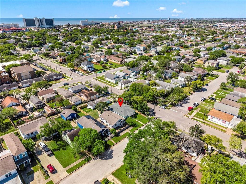 Home is close proximity to urban amenities, and a view of the coast. Ideal for those seeking a blend of suburban tranquility and city convenience.