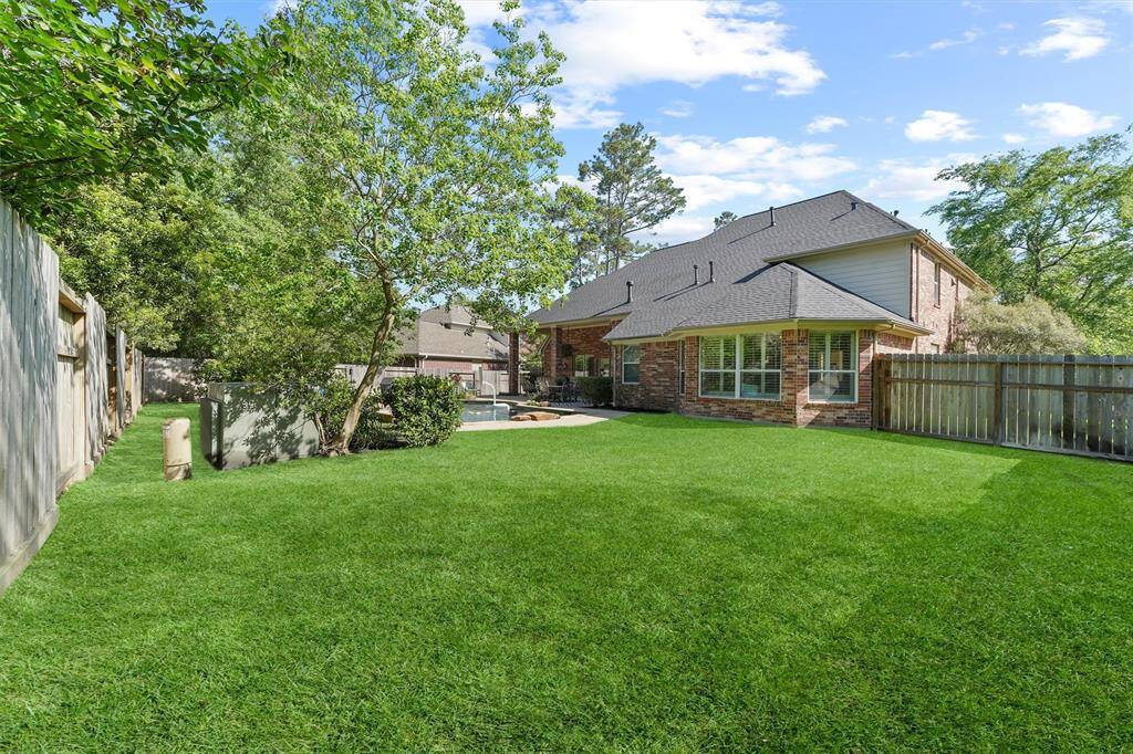 Sizeable backyard greenspace to enjoy the outdoors. New wifi sprinkler system. The fence was replaced in 2022.