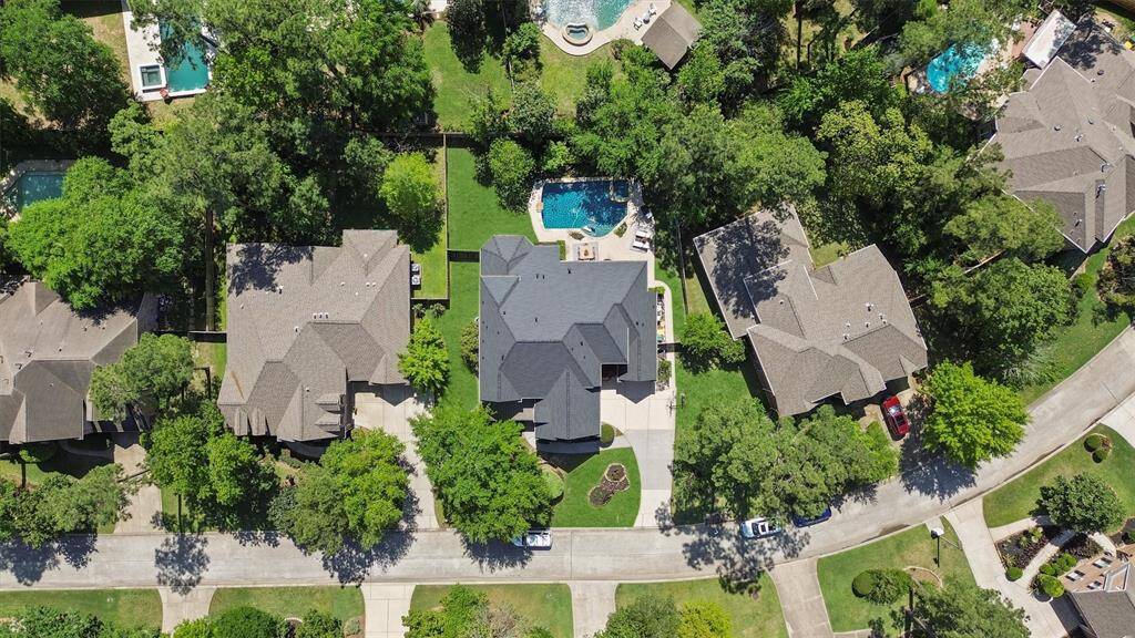 An aerial view of the 13,159 sq.-ft lot. with an inground pool in the back yard. 2 new HVAC systems and ductwork completed on the property.