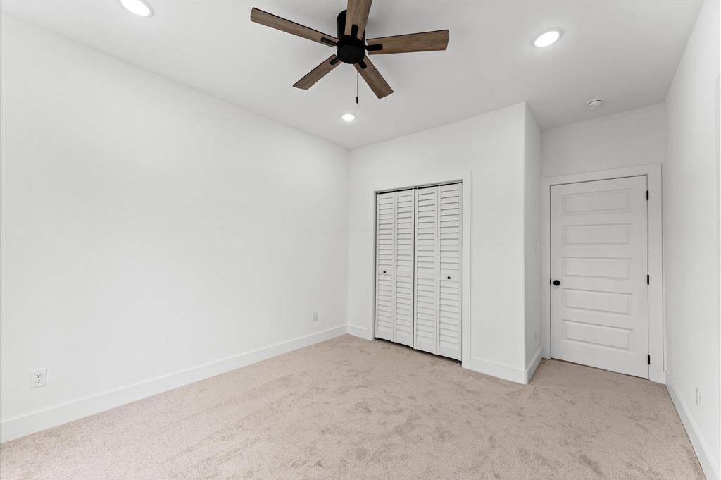 Like the other bedroom, Bedroom 3 offers a closet behind bifold doors.