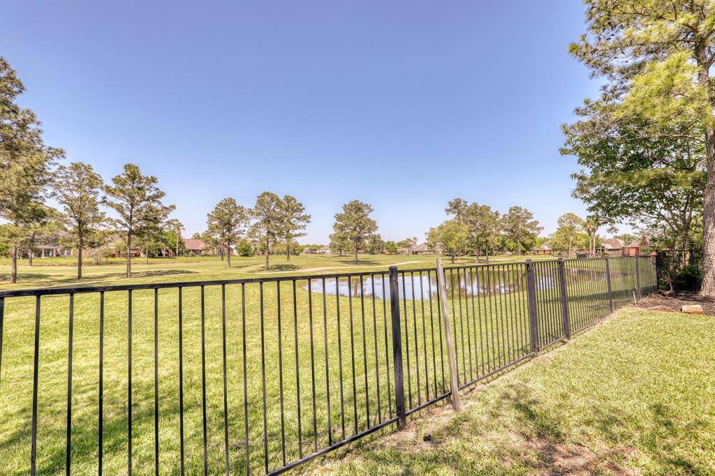 Panoramic golf course views create a serene backdrop to your outdoor space