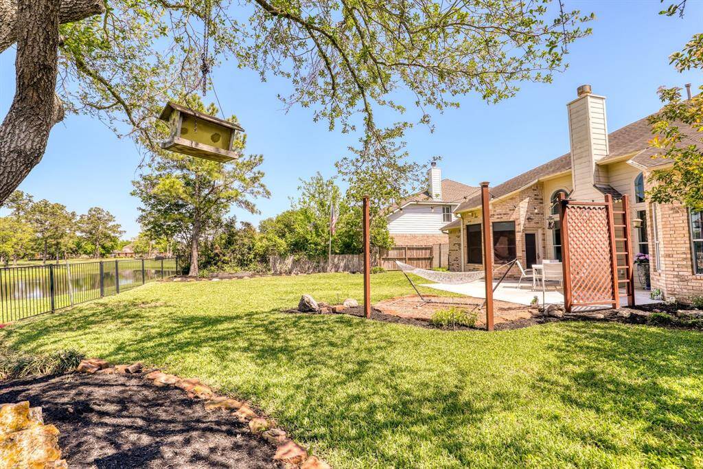 A peaceful backyard retreat, perfect for unwinding and enjoying the surrounding natural beauty