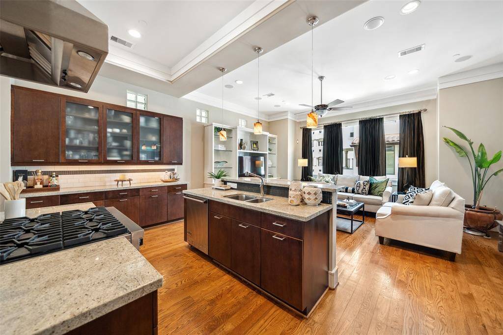 The kitchen opens seamlessly into the living area, creating a connected and welcoming space.