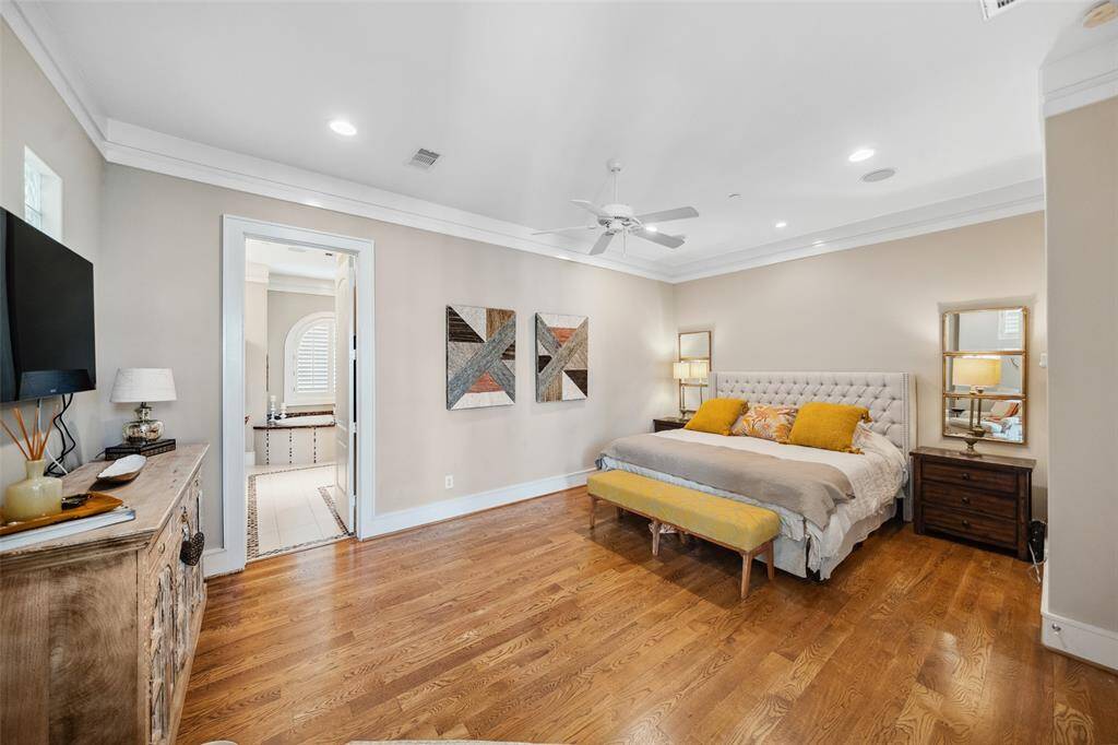 Occupying the entire third floor, the spacious primary suite offers a private retreat with room to spare—providing a peaceful escape from the bustle below.
