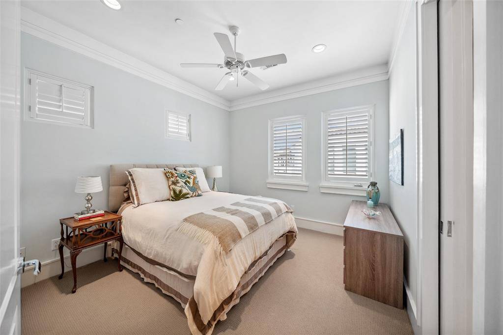 Also on the fourth floor is a spacious secondary bedroom with an en suite bath—offering flexibility to serve as a second primary suite for guests, live-in help, or multi-generational living. The in-home elevator provides convenient access to all floors, ensuring comfort for everyone.