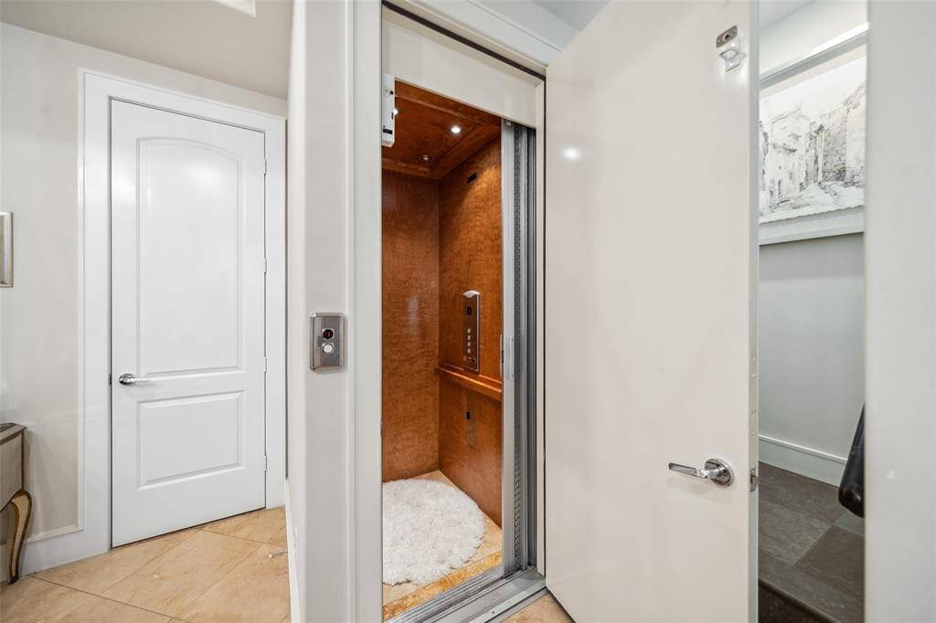An in-home elevator provides effortless access to all four floors—so you can skip the stairs when juggling groceries, suitcases, or a steaming cup of coffee.