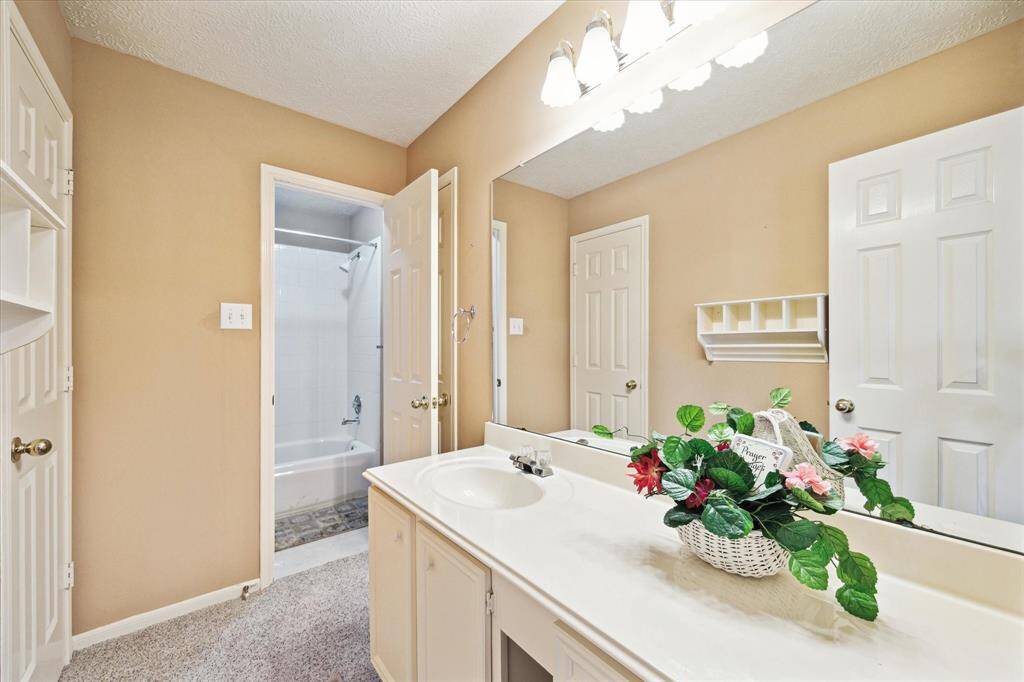 This spacious second-floor bathroom offers convenient access throughout the floor.