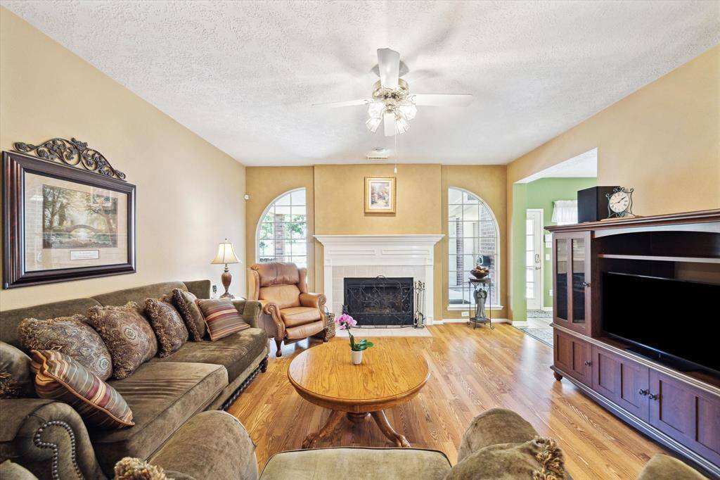 The den has great views of the backyard and is centrally located to other areas of the home.