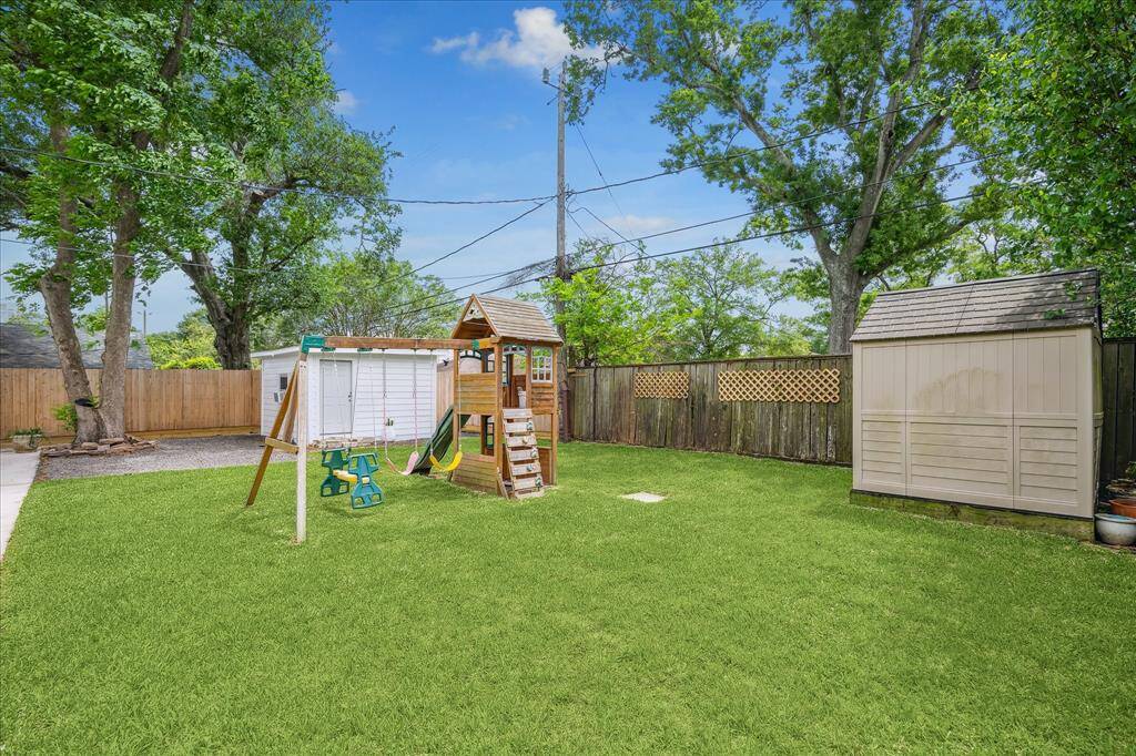 LANDLORDS HOPE THE TENANTS WILL CREATE MANY MEMORIES IN THIS LOVE FILLED BACKYARD AREA.