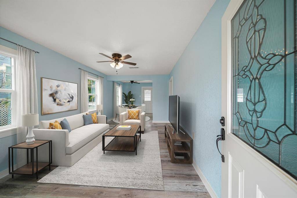 Stunning space filled with natural light! Virtually staged