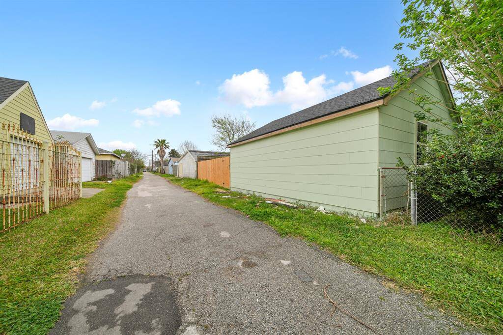 Alley side with new wood fence and gate!