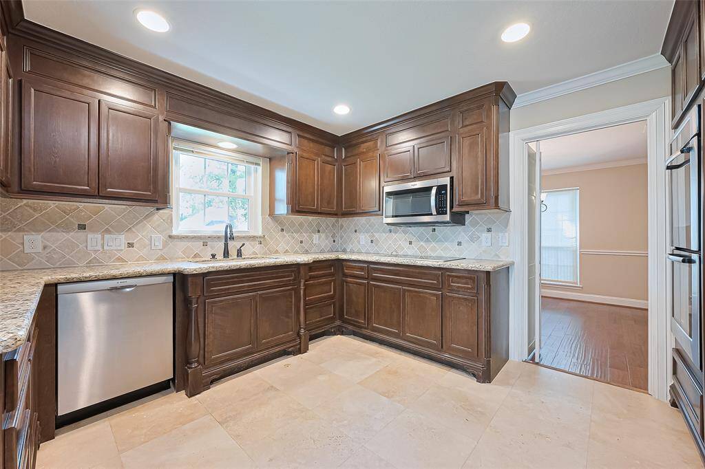 Elegant stainless Bosch dishwasher for a sleek kitchen upgrade as wll as a stainless microwave.
