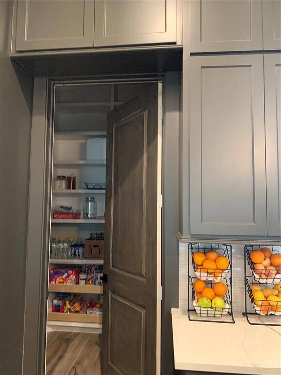 Entrance to the walk-in pantry in the kitchen.