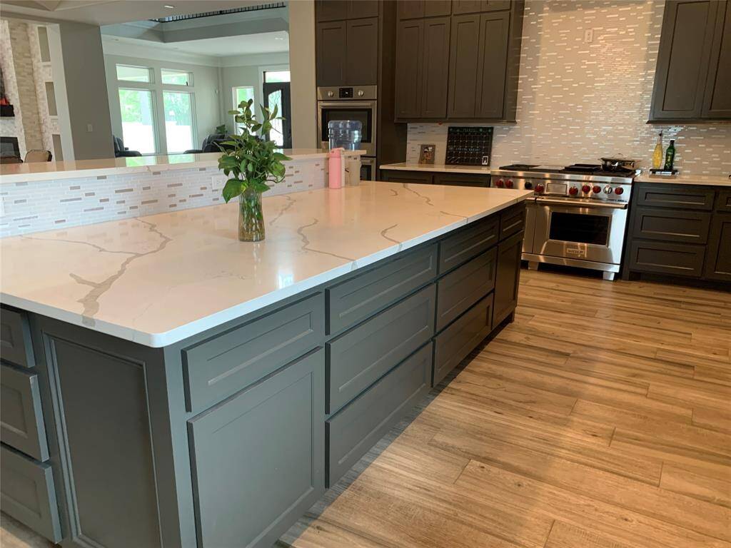 Kitchen island measure 6 feet x 10 feet with lots of storage space.