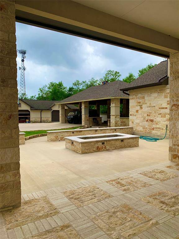The garden, pathway and outdoor kitchen and workshop