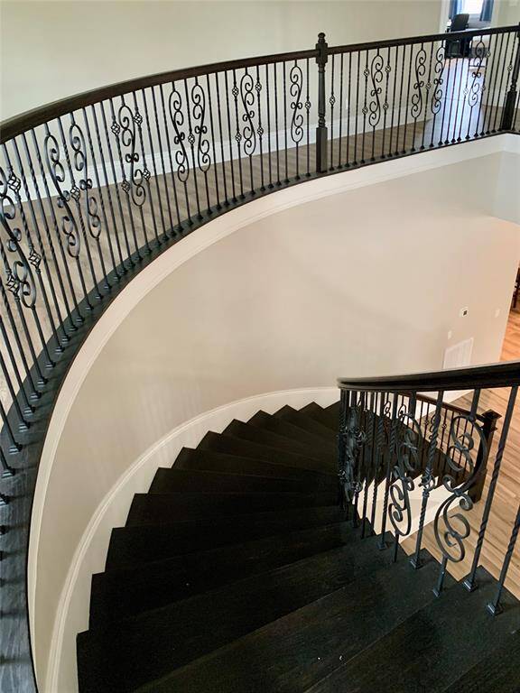 Beautiful curved stairway.