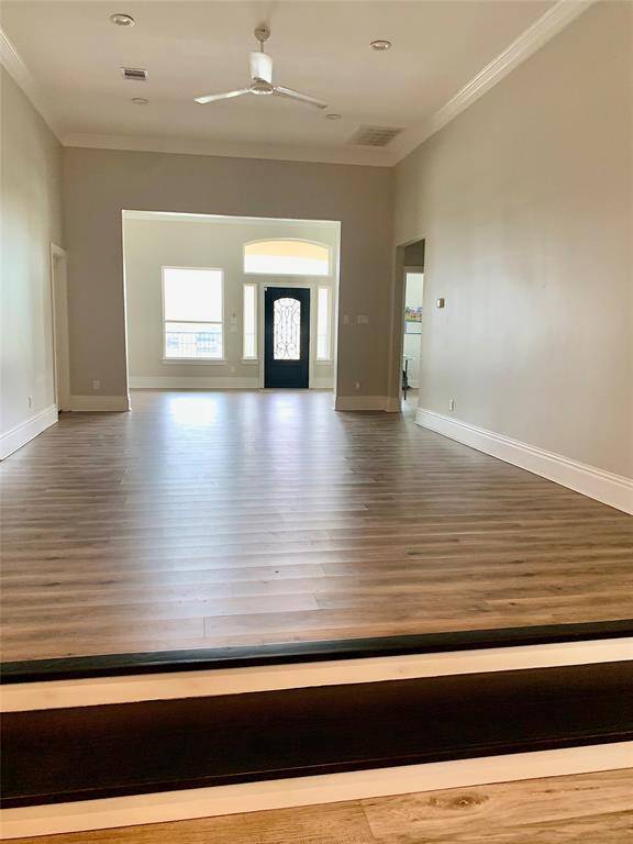 A step up from the kitchen, on the right are the two offices and on the left are two bedrooms with ensuite that could also be used as offices if needed.