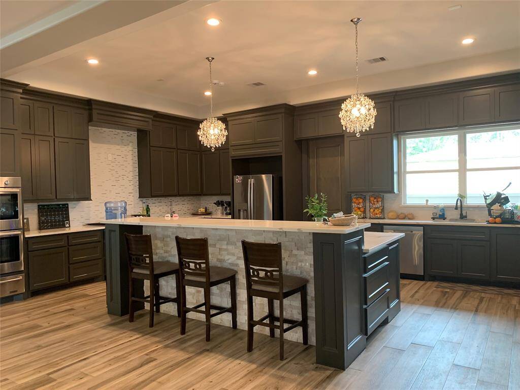 Two of many impressive light fixtures in the living spaces.