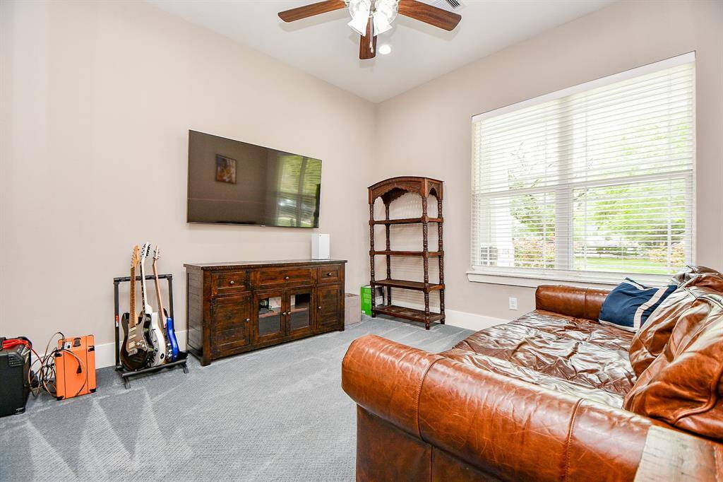The gameroom is a great space for video gaming, movie watching, or a music room. This cozy living space can be flexible to your needs.