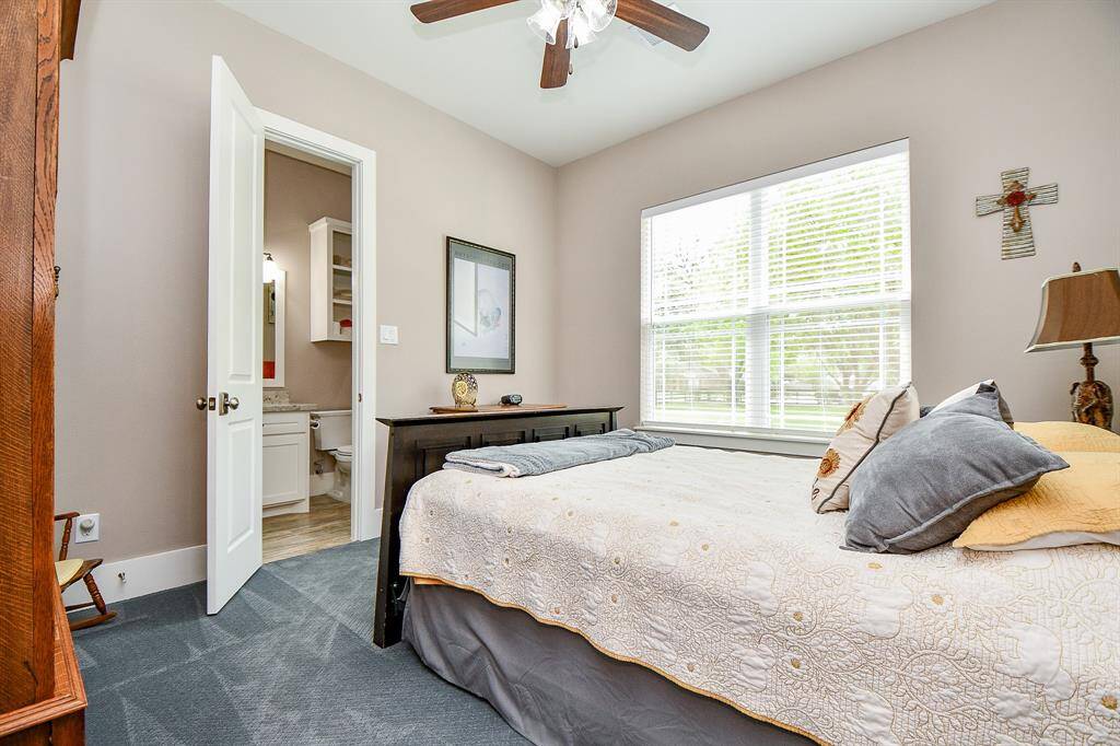 Cozy secondary suite with private bath. Peaceful and private—perfect for in-laws, guests or long-term visitors who need their own space but still want to be close to the action.