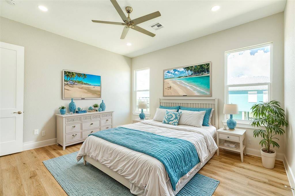 Luxurious primary bedroom with an elegant en-suite, beautifully virtually staged.