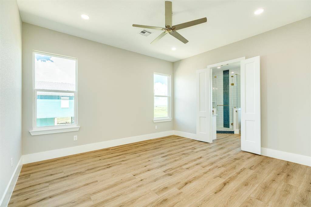 Spacious primary bedroom with a private en-suite bath.