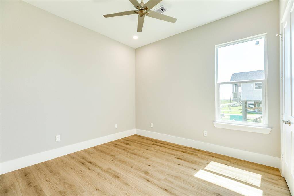 Move-in ready Bedroom 2 features fresh finishes and ample natural light.