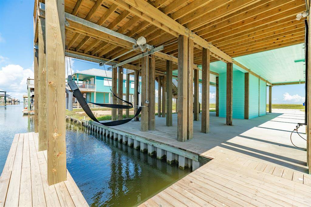 Convenient ground floor boat lift for effortless Gulf access.