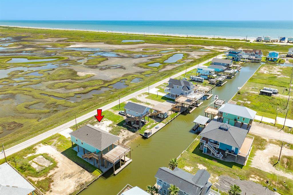 Prime canal front home with direct canal access, perfect for fishing enthusiasts. Enjoy serene views and quick access to open water.