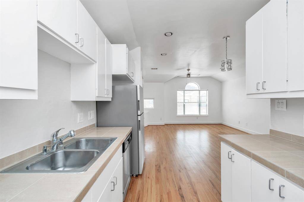 Kitchen area overlooking living room.