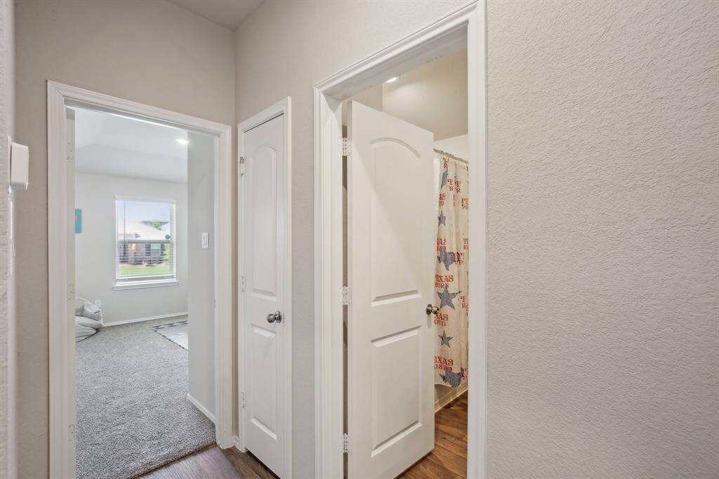 Guest bathroom is conveniently located between bedrooms 2 & 3.