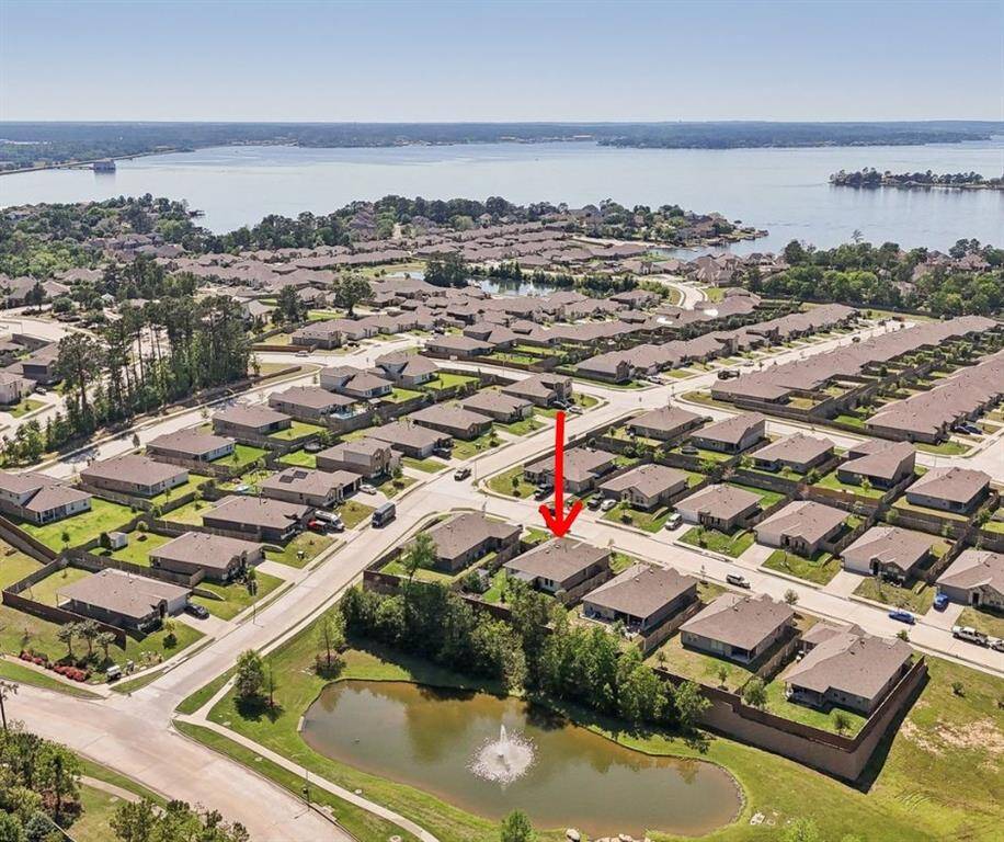 Prime location in Water Crest on Lake Conroe with no back neighbors and walking distance to the community pool and lake access.