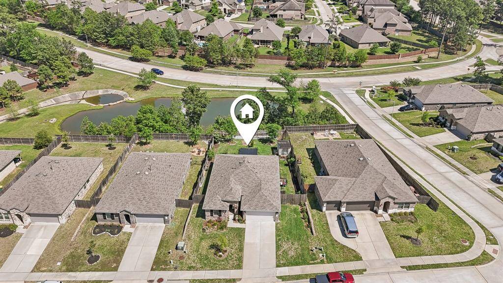 Enjoy a double wide driveway and no neighbors behind you.