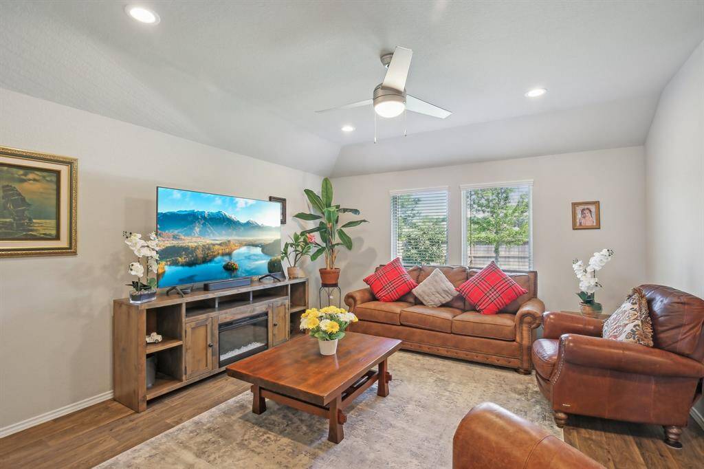 Nice size living room accommodates large furniture.