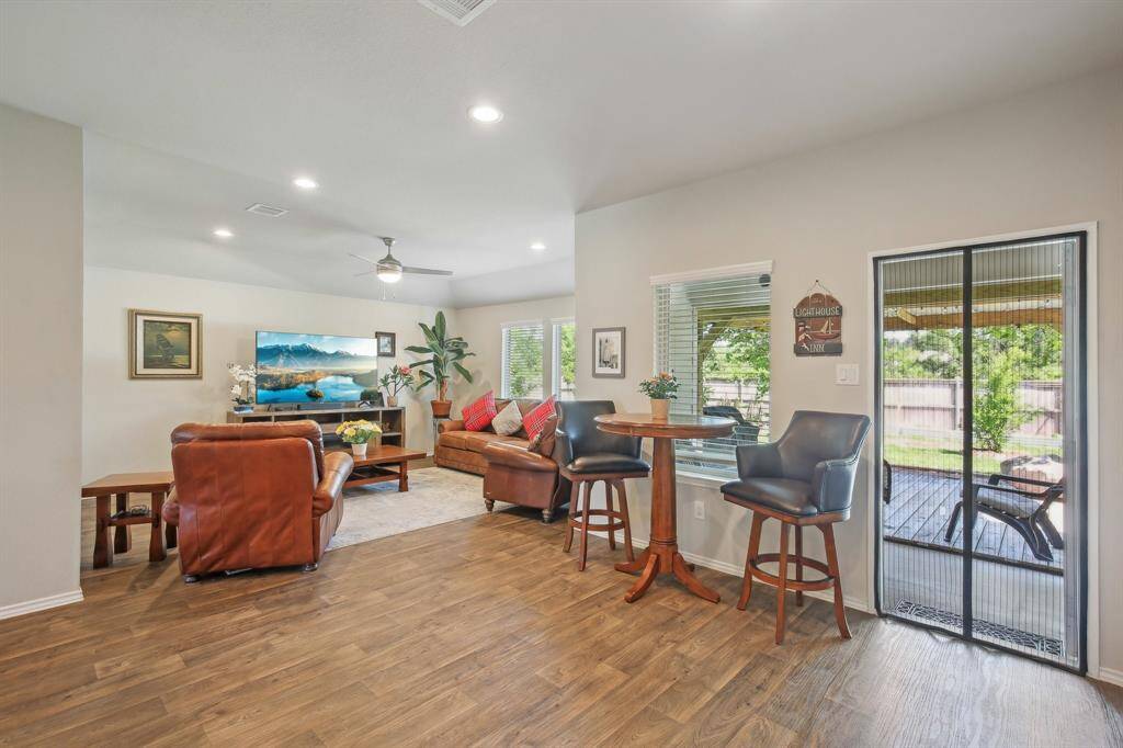 You will love the extended covered patio.  Lots of fruit trees and did I mention, no neighbors are behind you?