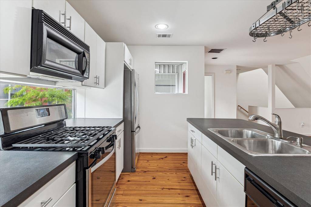 All appliances, including refrigerator, convey.