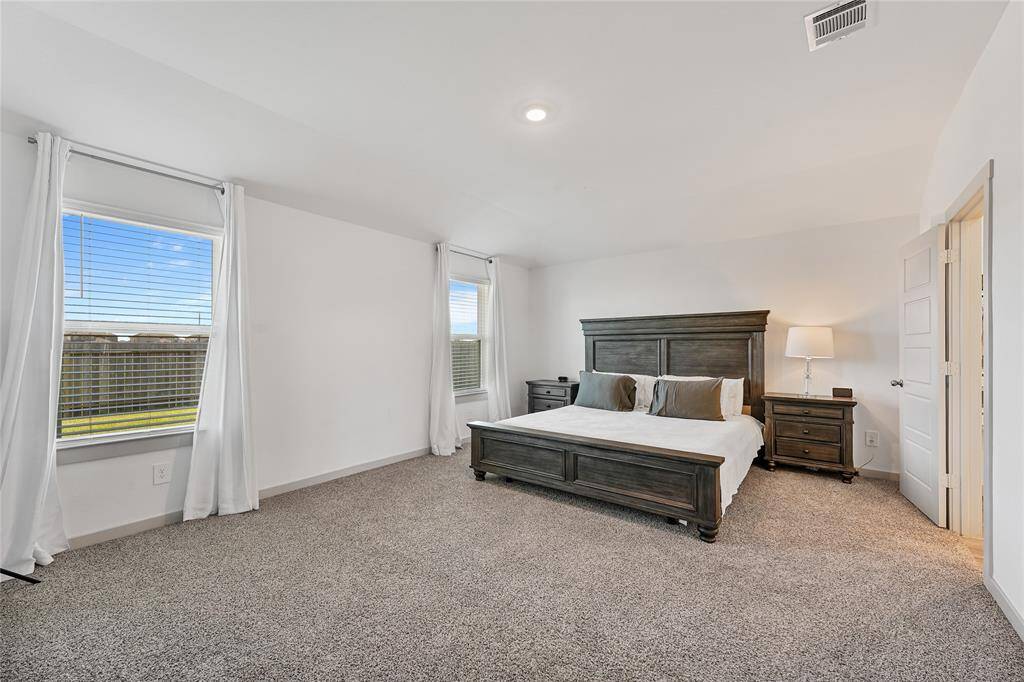 Primary Bedroom with Stunning Backyard View!