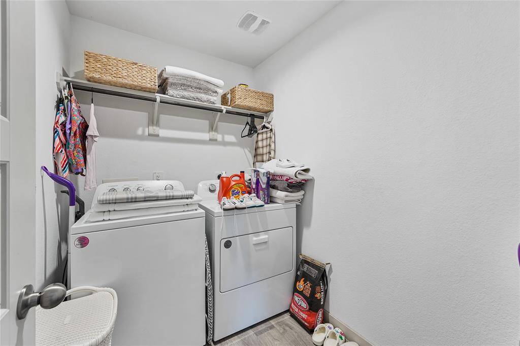 Laundry Room with Convenient Shelving for Storage